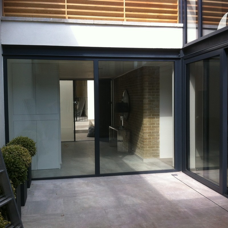 Floor-to-ceiling sliding doors opening to courtyard in Lambeth