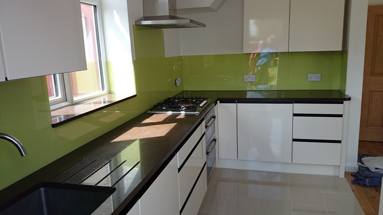 Lime green glass kitchen splashback installed by Lambeth glaziers